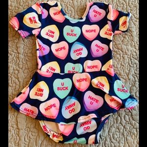 Small shop sour hearts skirted Leo 9-12,Months